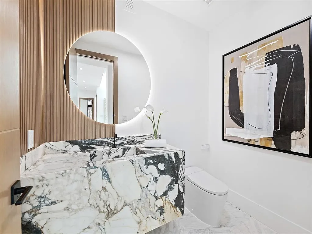 Stunning $10.2 Million New Construction Waterfront Mansion in Fort Lauderdale Hits the Market 15 Luxury waterfront home at 111 Fiesta Way in Fort Lauderdale with canal frontage, pool, and modern three-story architecture.