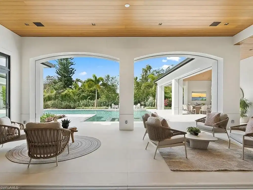 Stunning $14 Million Luxury Estate in Naples Sets a Bold New Standard for Modern Living in Pine Ridge Estates 17 Luxury estate exterior at 117 West ST, a stunning Home in Naples for sale located in Pine Ridge Estates