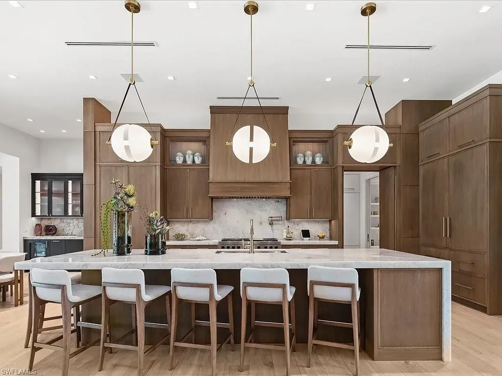 Stunning $14 Million Luxury Estate in Naples Sets a Bold New Standard for Modern Living in Pine Ridge Estates 10 Luxury estate exterior at 117 West ST, a stunning Home in Naples for sale located in Pine Ridge Estates