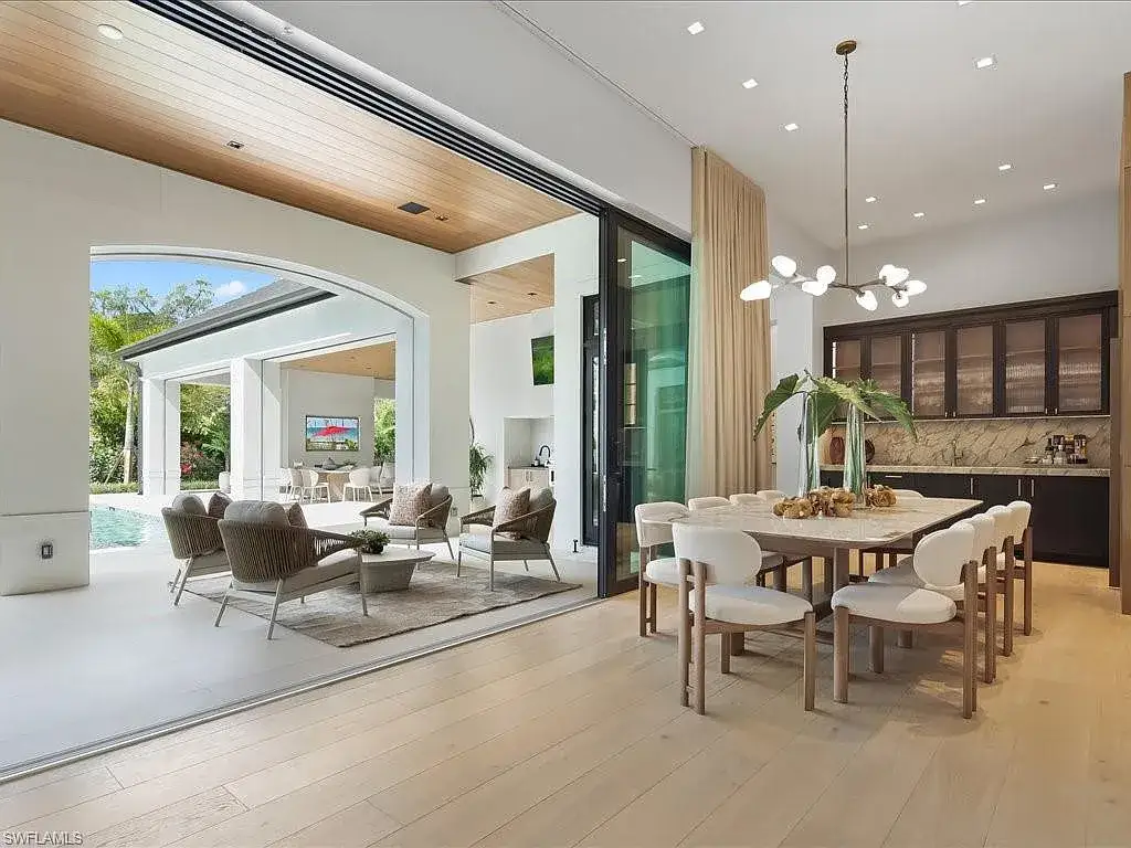 Stunning $14 Million Luxury Estate in Naples Sets a Bold New Standard for Modern Living in Pine Ridge Estates 11 Luxury estate exterior at 117 West ST, a stunning Home in Naples for sale located in Pine Ridge Estates