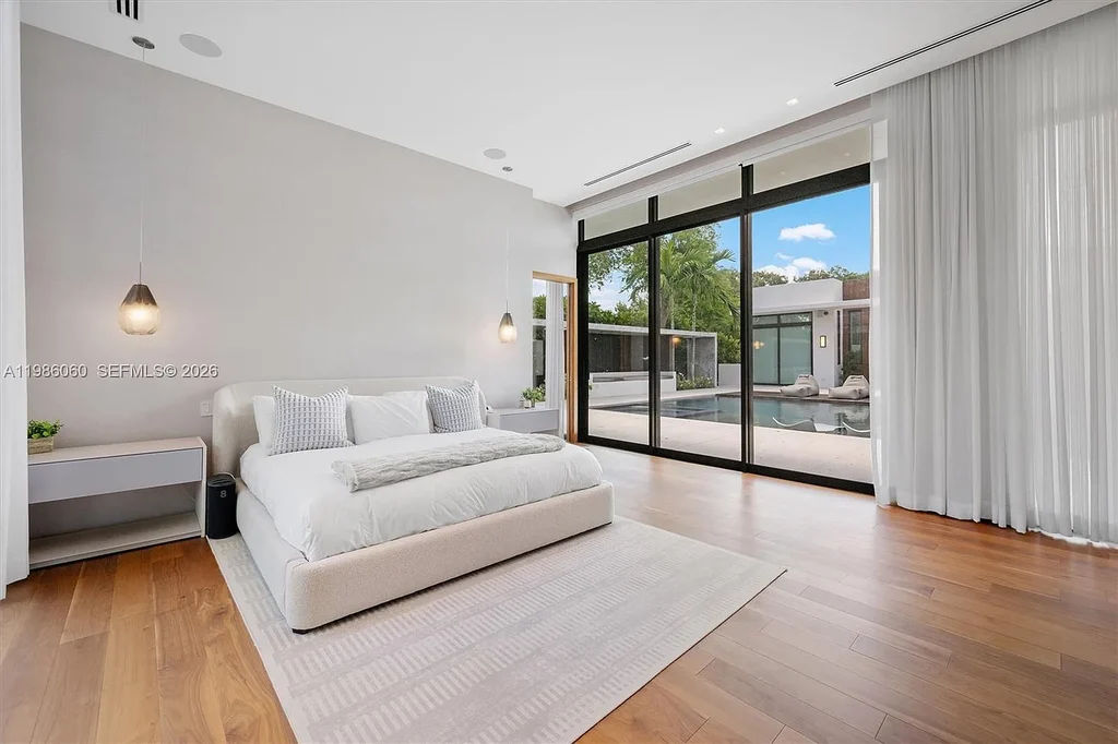 $7 Million Stunning Modern Masterpiece in Miami Shores, Exceptional Luxury Home for Sale Near Biscayne Bay 12 1200 NE 94th St modern luxury home in Miami Shores with pool, outdoor kitchen, and contemporary coastal design