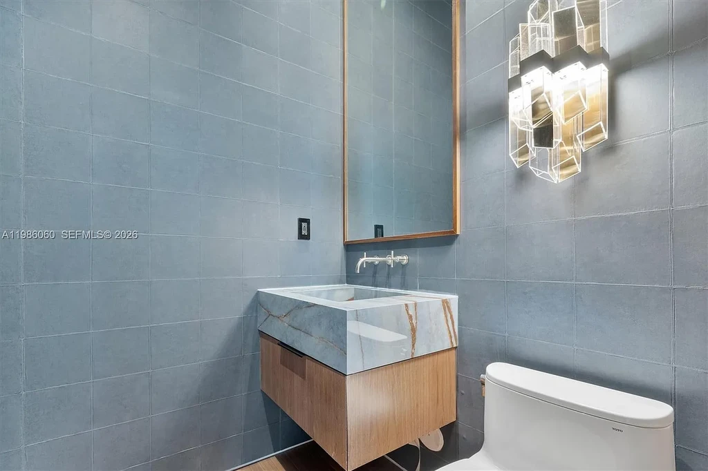 $7 Million Stunning Modern Masterpiece in Miami Shores, Exceptional Luxury Home for Sale Near Biscayne Bay 11 1200 NE 94th St modern luxury home in Miami Shores with pool, outdoor kitchen, and contemporary coastal design