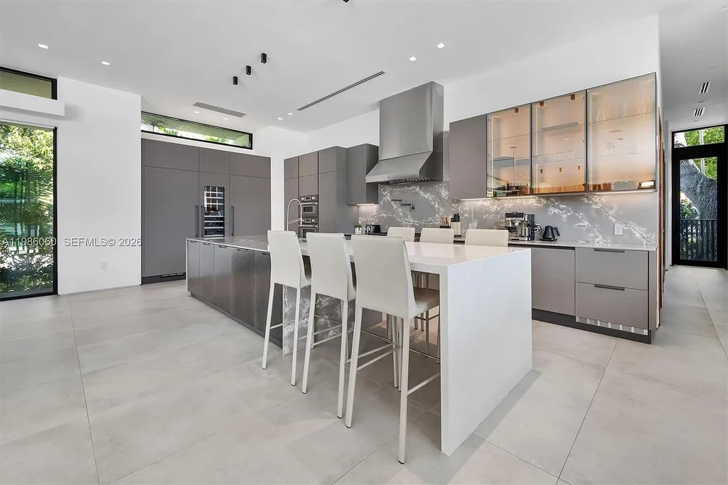 $7 Million Stunning Modern Masterpiece in Miami Shores, Exceptional Luxury Home for Sale Near Biscayne Bay 8 1200 NE 94th St modern luxury home in Miami Shores with pool, outdoor kitchen, and contemporary coastal design