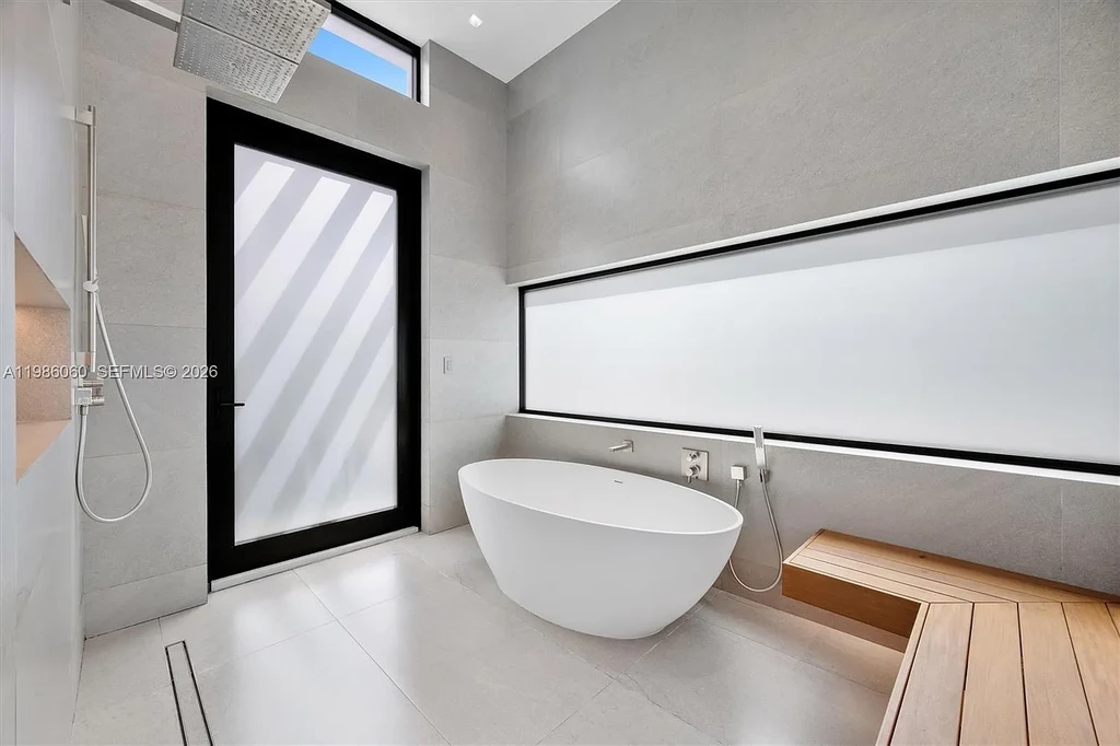 $7 Million Stunning Modern Masterpiece in Miami Shores, Exceptional Luxury Home for Sale Near Biscayne Bay 13 1200 NE 94th St modern luxury home in Miami Shores with pool, outdoor kitchen, and contemporary coastal design