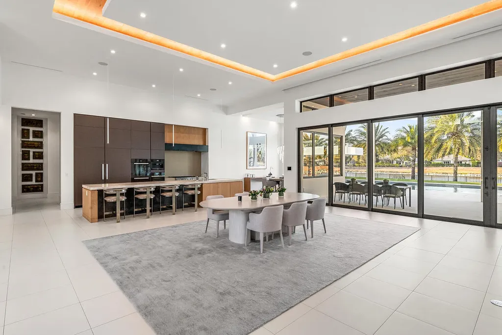$10.9 Million Waterfront Estate in Wellington Showcases Luxury Living in Palm Beach Polo Community 9 Luxury waterfront estate in Wellington Florida featuring modern architecture, private pool, and scenic pond views in Palm Beach Polo community