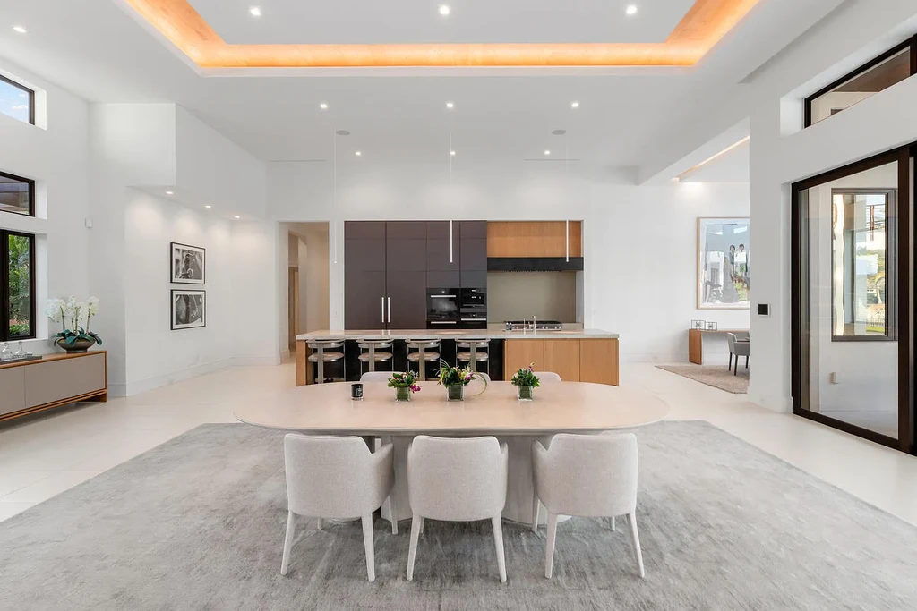 $10.9 Million Waterfront Estate in Wellington Showcases Luxury Living in Palm Beach Polo Community 8 Luxury waterfront estate in Wellington Florida featuring modern architecture, private pool, and scenic pond views in Palm Beach Polo community