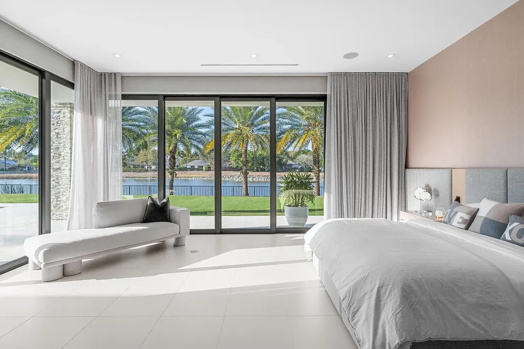 $10.9 Million Waterfront Estate in Wellington Showcases Luxury Living in Palm Beach Polo Community 10 Luxury waterfront estate in Wellington Florida featuring modern architecture, private pool, and scenic pond views in Palm Beach Polo community