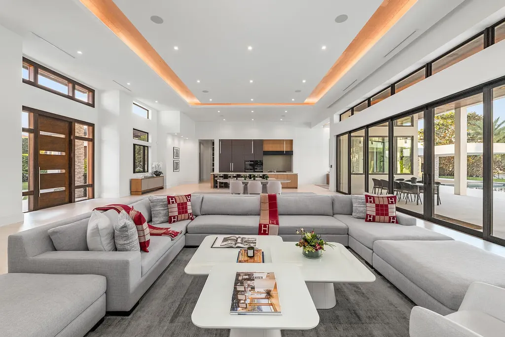 $10.9 Million Waterfront Estate in Wellington Showcases Luxury Living in Palm Beach Polo Community 7 Luxury waterfront estate in Wellington Florida featuring modern architecture, private pool, and scenic pond views in Palm Beach Polo community