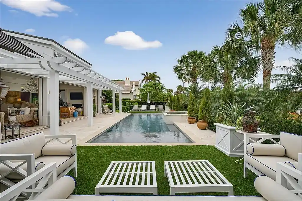 Stunning $7.8 Million Luxury Golf Estate in Indian River Shores Real Estate, Exclusive Resort-Style Living Opportunity 6 Luxury golf course home at 140 Island Creek Dr in Indian River Shores with pool and landscaped backyard