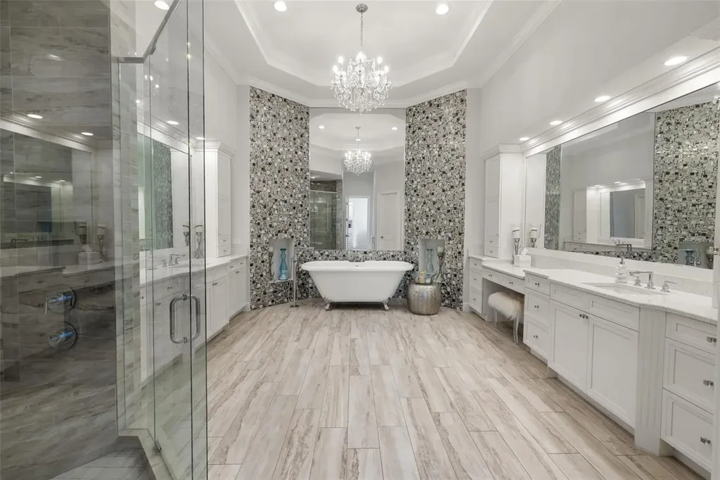 $6 Million Lakefront Mediterranean Estate Elevates Luxury Living in Odessa with Nearly Six Private Acres 16 Front elevation of 17124 Crawley Rd showcasing gated entrance and expansive estate grounds in Odessa Real Estate