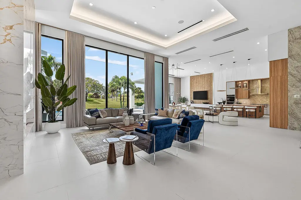 A $12.5 Million Contemporary Estate Redefines Luxury Living in Boca Raton’s Prestigious St Andrews Country Club 10 Modern luxury home at 17699 Lake Estates Drive in Boca Raton featuring a resort-style pool, expansive glass architecture, and contemporary design in St Andrews Country Club