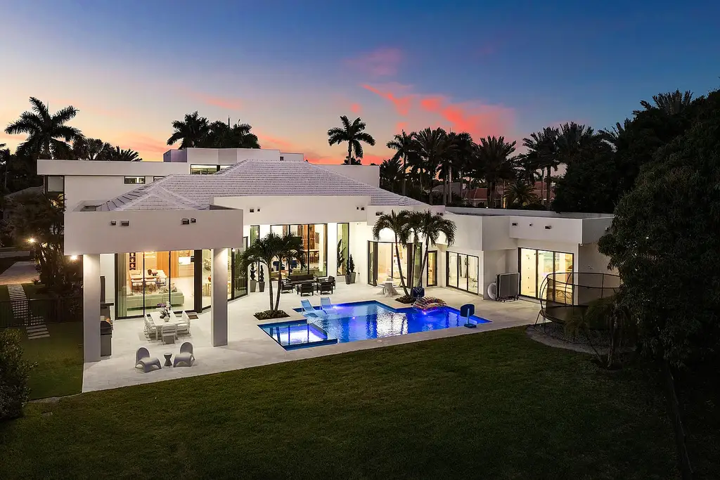 A $12.5 Million Contemporary Estate Redefines Luxury Living in Boca Raton’s Prestigious St Andrews Country Club 17 Modern luxury home at 17699 Lake Estates Drive in Boca Raton featuring a resort-style pool, expansive glass architecture, and contemporary design in St Andrews Country Club