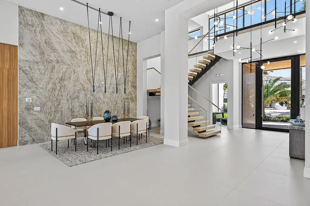 A $12.5 Million Contemporary Estate Redefines Luxury Living in Boca Raton’s Prestigious St Andrews Country Club 13 Modern luxury home at 17699 Lake Estates Drive in Boca Raton featuring a resort-style pool, expansive glass architecture, and contemporary design in St Andrews Country Club