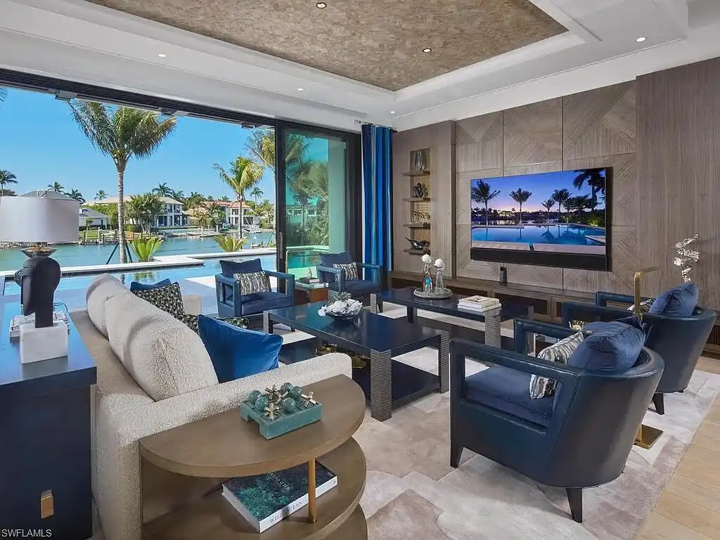 $44 Million Iconic Gulf-Access Estate in Port Royal Showcases the Pinnacle of Naples Luxury Living 6 3220 Rum Row luxury waterfront estate in Port Royal Naples featuring modern coastal architecture and lush tropical landscaping