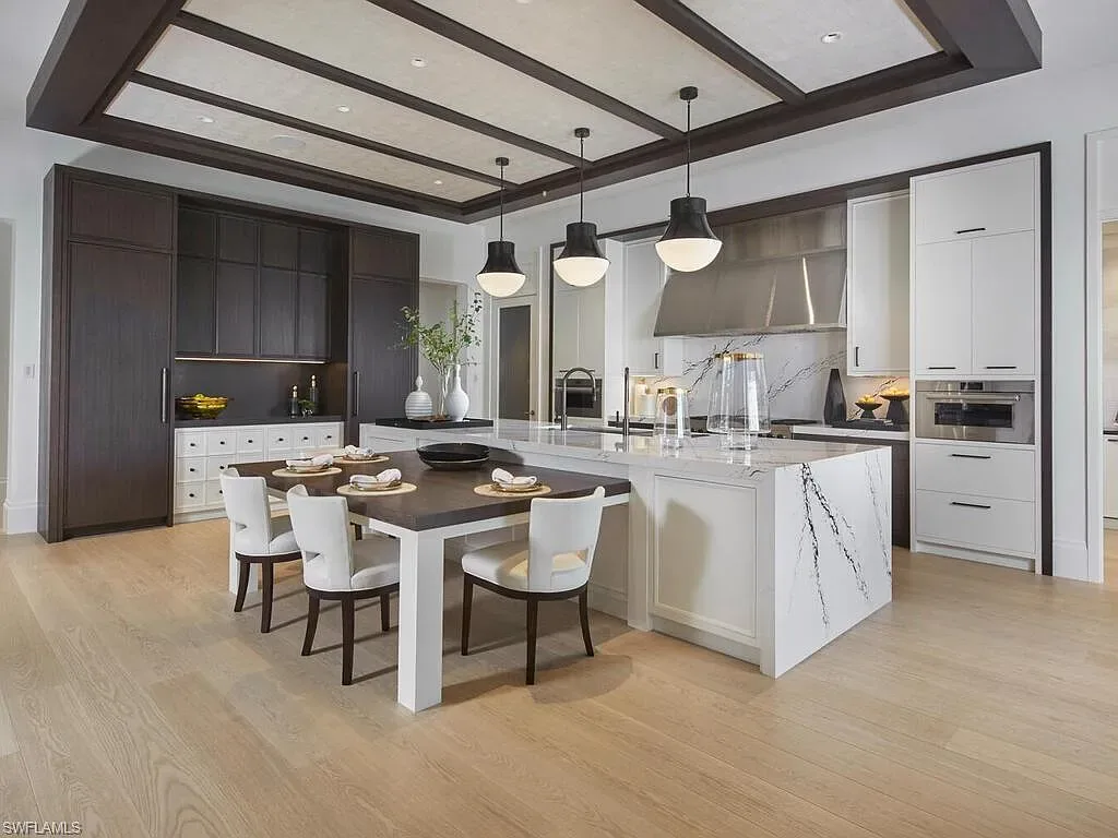 $44 Million Iconic Gulf-Access Estate in Port Royal Showcases the Pinnacle of Naples Luxury Living 10 3220 Rum Row luxury waterfront estate in Port Royal Naples featuring modern coastal architecture and lush tropical landscaping