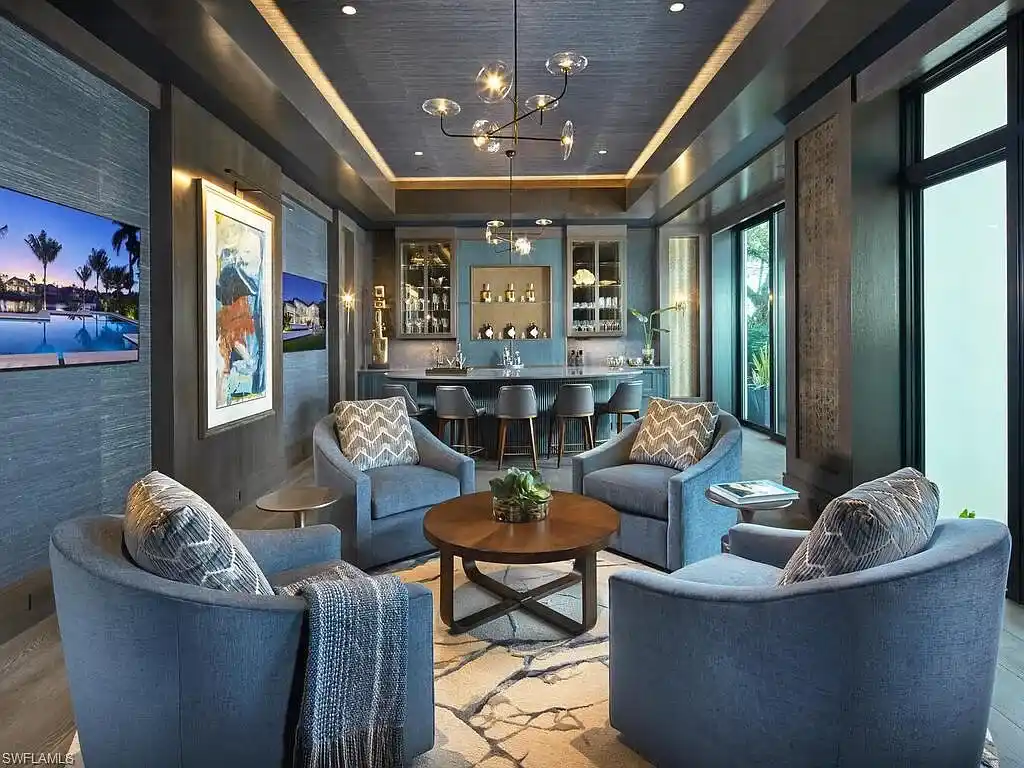 $44 Million Iconic Gulf-Access Estate in Port Royal Showcases the Pinnacle of Naples Luxury Living 7 3220 Rum Row luxury waterfront estate in Port Royal Naples featuring modern coastal architecture and lush tropical landscaping