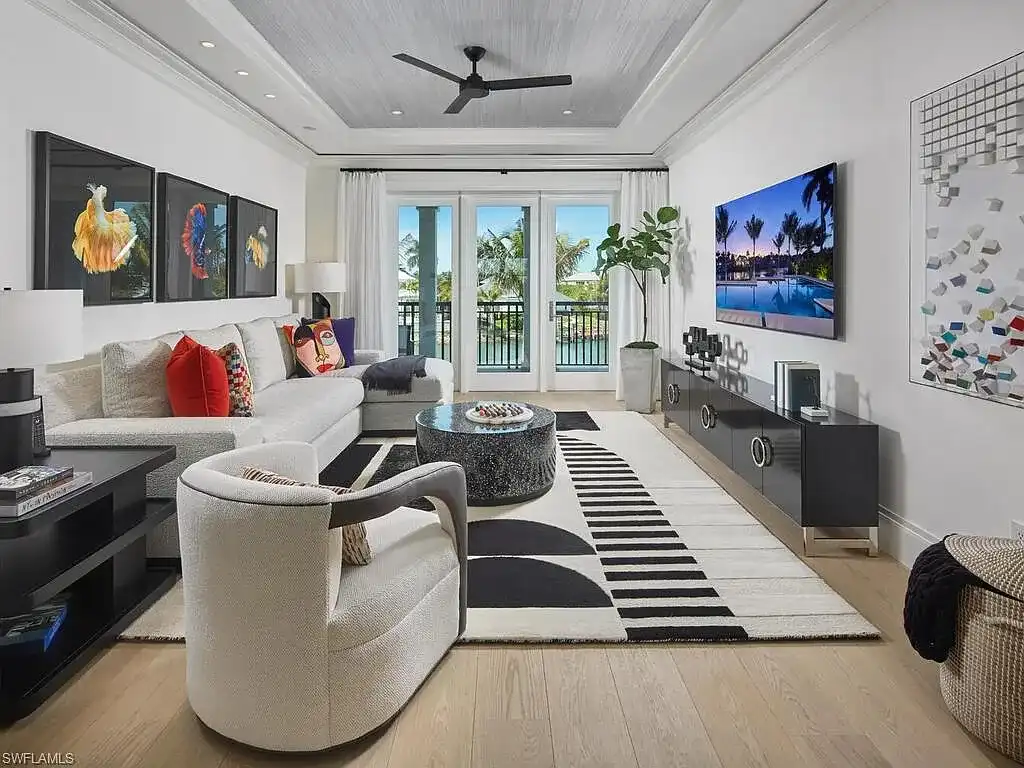 $44 Million Iconic Gulf-Access Estate in Port Royal Showcases the Pinnacle of Naples Luxury Living 9 3220 Rum Row luxury waterfront estate in Port Royal Naples featuring modern coastal architecture and lush tropical landscaping