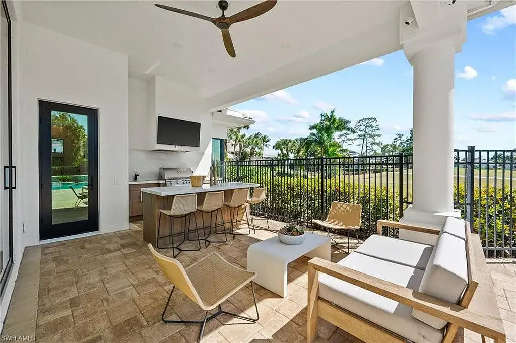Stunning $6.4 Million Fully Renovated Quail West Estate Redefines Luxury Living in Naples 16 4260 Brynwood DR luxury home in Naples Florida with golf course views, resort-style pool and spa, fully renovated modern interior in Quail West community