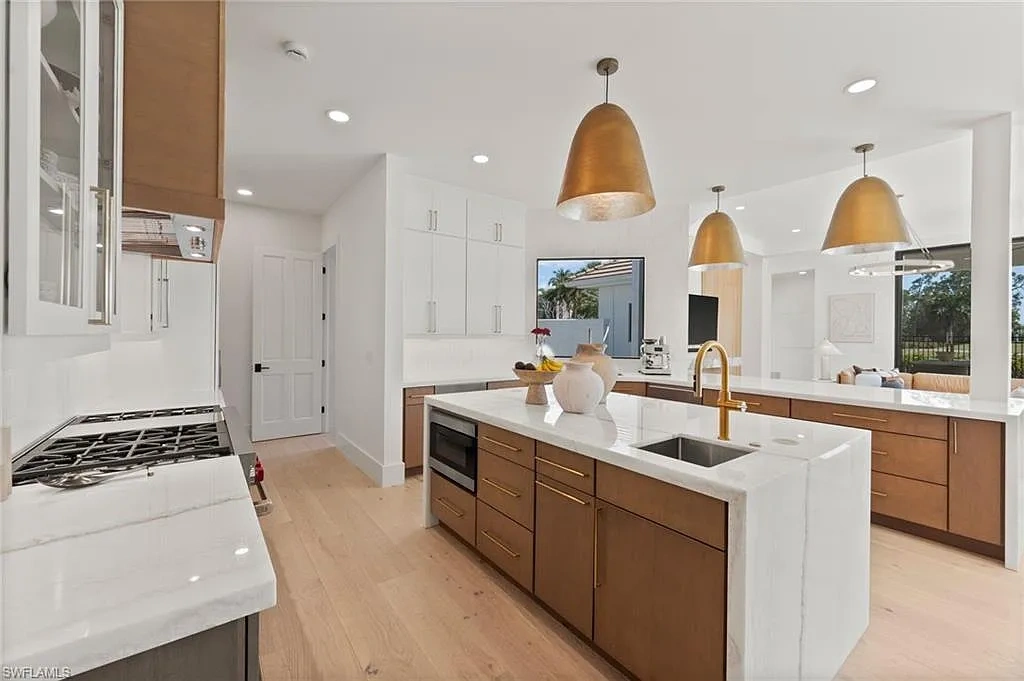 Stunning $6.4 Million Fully Renovated Quail West Estate Redefines Luxury Living in Naples 10 4260 Brynwood DR luxury home in Naples Florida with golf course views, resort-style pool and spa, fully renovated modern interior in Quail West community