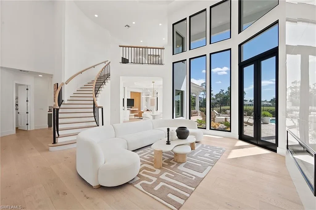 Stunning $6.4 Million Fully Renovated Quail West Estate Redefines Luxury Living in Naples 8 4260 Brynwood DR luxury home in Naples Florida with golf course views, resort-style pool and spa, fully renovated modern interior in Quail West community