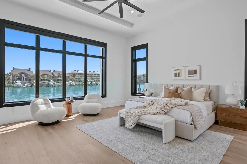 $8.95M Spectacular Waterfront Estate in Saint Petersburg Showcasing Ultimate Gulf-Access Luxury Living 11 Luxury waterfront exterior of 500 Barcelona Dr, a premier home in Saint Petersburg for sale with private dock