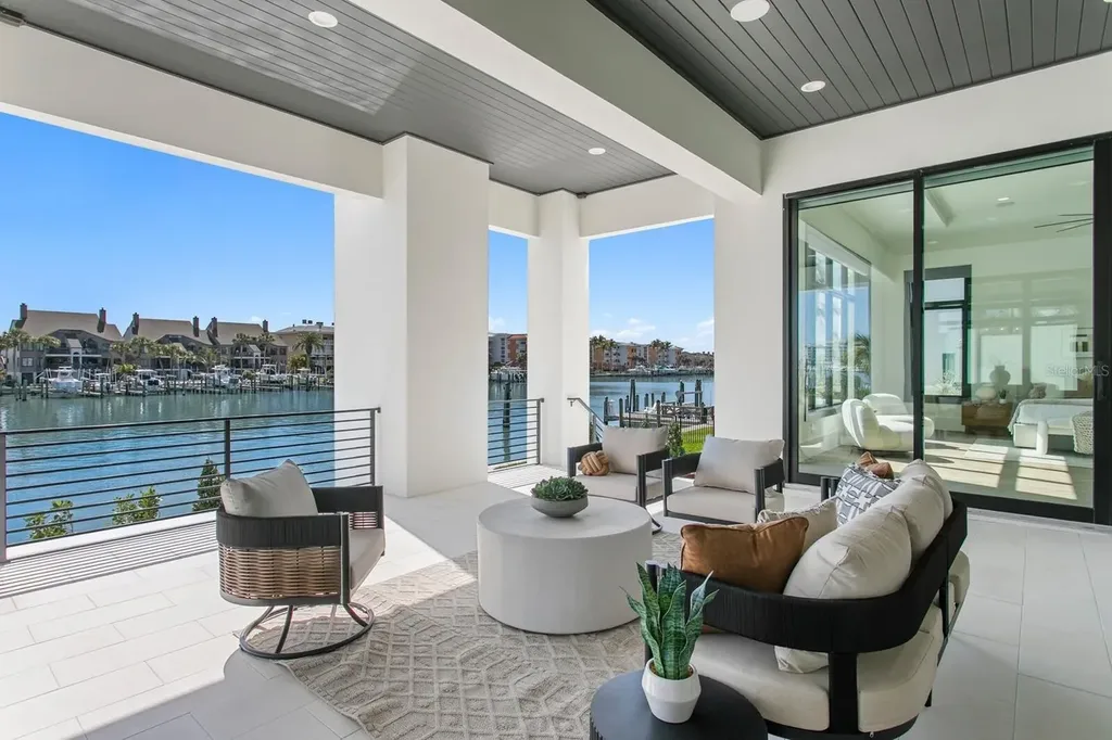 $8.95M Spectacular Waterfront Estate in Saint Petersburg Showcasing Ultimate Gulf-Access Luxury Living 16 Luxury waterfront exterior of 500 Barcelona Dr, a premier home in Saint Petersburg for sale with private dock