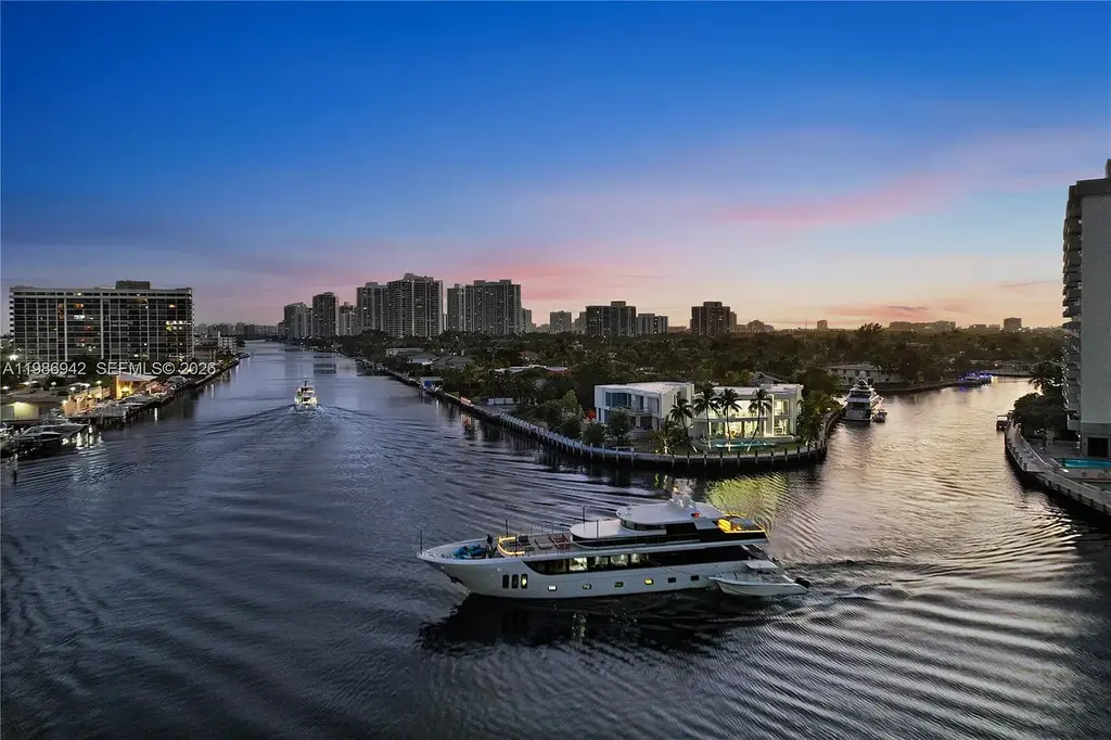 $13 Million Breathtaking Waterfront Estate in Hallandale Beach with 315 Feet Frontage and Private Mega Yacht Dock 16 Modern waterfront estate at 501 Palm Dr in Hallandale Beach with infinity pool, private dock, and Intracoastal views