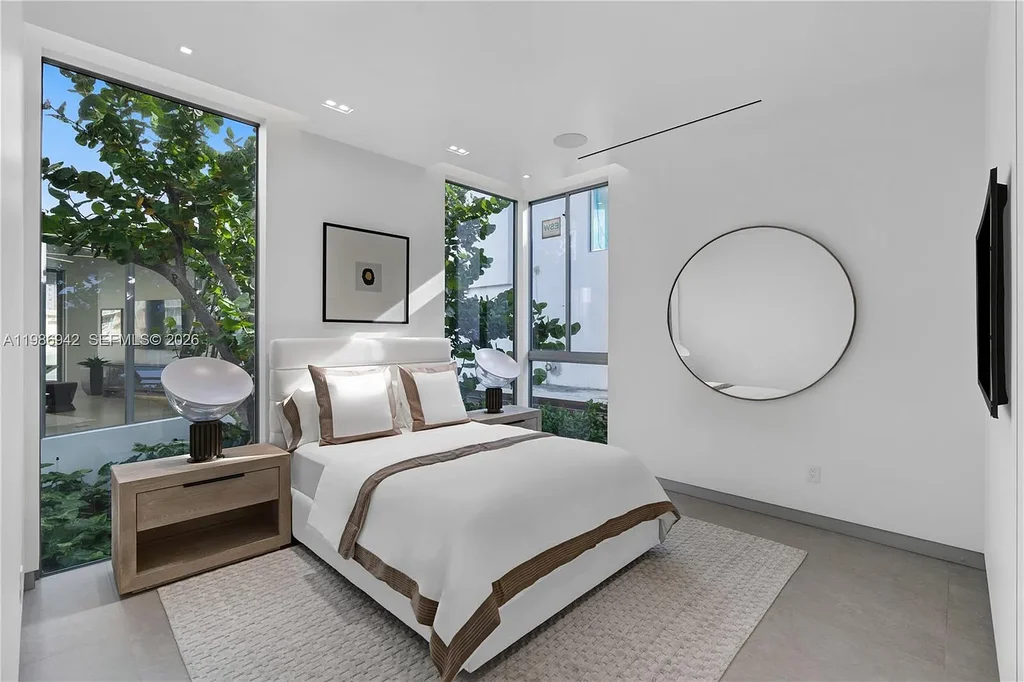 $13 Million Breathtaking Waterfront Estate in Hallandale Beach with 315 Feet Frontage and Private Mega Yacht Dock 14 Modern waterfront estate at 501 Palm Dr in Hallandale Beach with infinity pool, private dock, and Intracoastal views