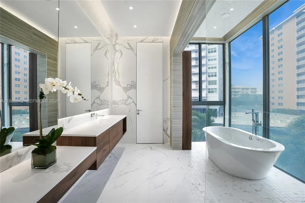 $13 Million Breathtaking Waterfront Estate in Hallandale Beach with 315 Feet Frontage and Private Mega Yacht Dock 13 Modern waterfront estate at 501 Palm Dr in Hallandale Beach with infinity pool, private dock, and Intracoastal views