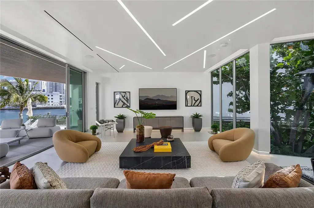 $13 Million Breathtaking Waterfront Estate in Hallandale Beach with 315 Feet Frontage and Private Mega Yacht Dock 6 Modern waterfront estate at 501 Palm Dr in Hallandale Beach with infinity pool, private dock, and Intracoastal views