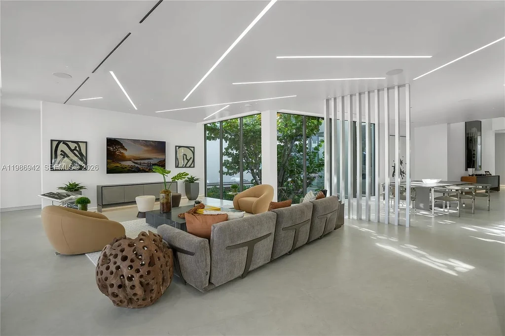 $13 Million Breathtaking Waterfront Estate in Hallandale Beach with 315 Feet Frontage and Private Mega Yacht Dock 7 Modern waterfront estate at 501 Palm Dr in Hallandale Beach with infinity pool, private dock, and Intracoastal views