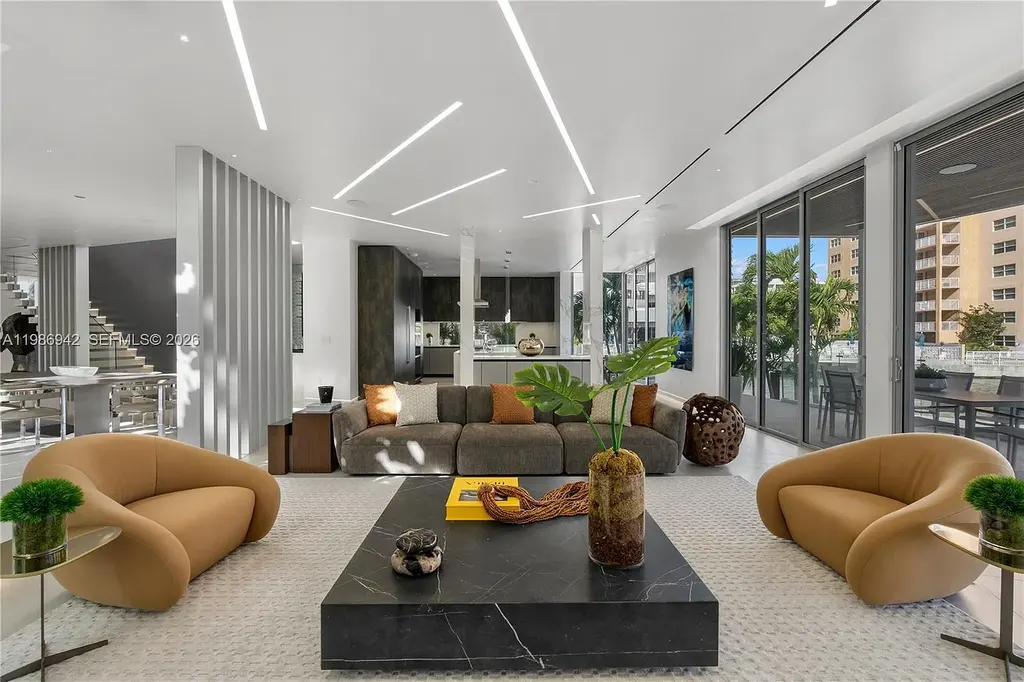 $13 Million Breathtaking Waterfront Estate in Hallandale Beach with 315 Feet Frontage and Private Mega Yacht Dock 8 Modern waterfront estate at 501 Palm Dr in Hallandale Beach with infinity pool, private dock, and Intracoastal views