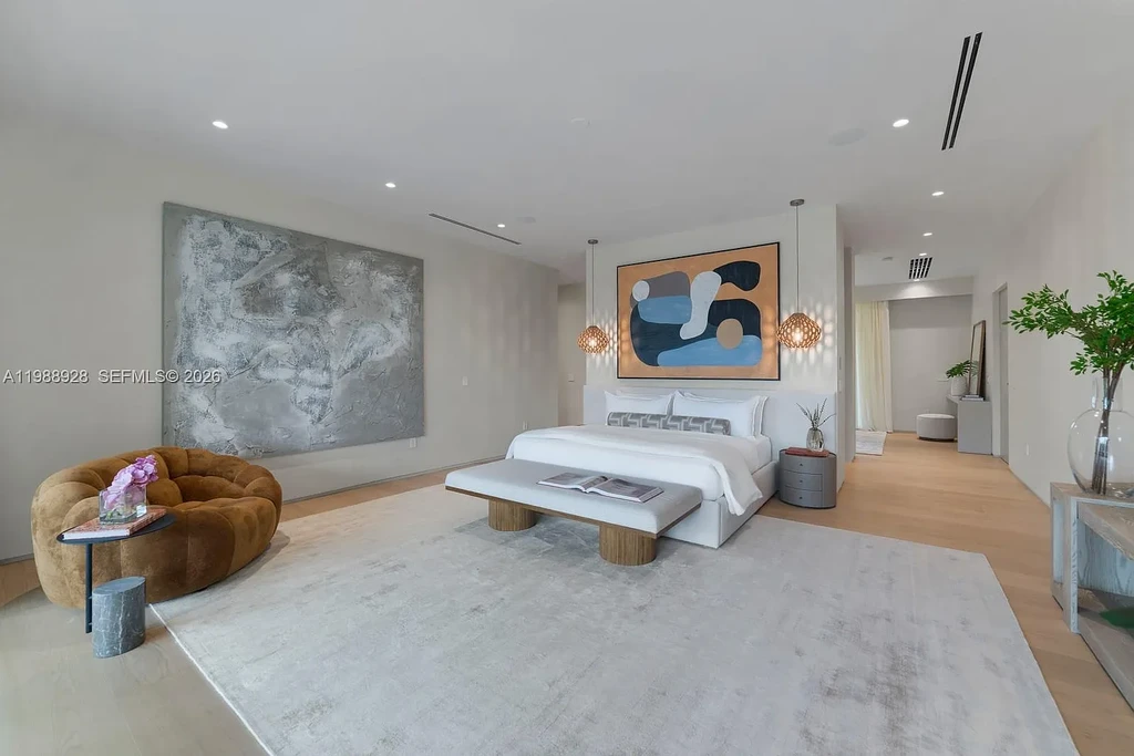 A $22 Million Tropical Modern Estate Brings Resort-Style Living to Miami’s Prestigious Ponce Davis 12 Luxury tropical modern estate in Miami with private tennis court, pool, and expansive outdoor living spaces at sunset