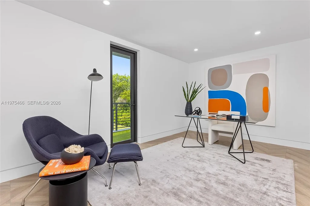 $10.4 Million Spectacular Modern Estate Redefining Luxury Living in Prime Pinecrest Real Estate 11 Chef’s kitchen with premium appliances and oversized island at 6445 SW 129th Ter Pinecrest