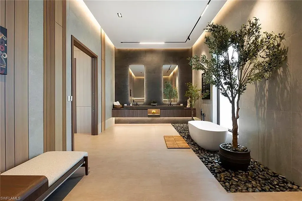 $14.5 Million Stunning Resort-Style Masterpiece in Naples Real Estate Showcases Breathtaking Modern Luxury Living 14 6616 Trail BLVD Naples luxury home with modern architecture, infinity pool, lakefront views, and resort-style outdoor living in Pine Ridge Estates