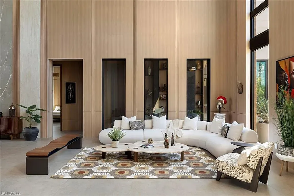 $14.5 Million Stunning Resort-Style Masterpiece in Naples Real Estate Showcases Breathtaking Modern Luxury Living 9 6616 Trail BLVD Naples luxury home with modern architecture, infinity pool, lakefront views, and resort-style outdoor living in Pine Ridge Estates