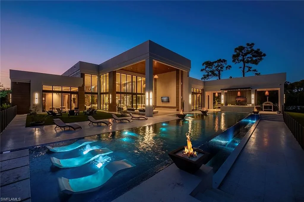 $14.5 Million Stunning Resort-Style Masterpiece in Naples Real Estate Showcases Breathtaking Modern Luxury Living 6 6616 Trail BLVD Naples luxury home with modern architecture, infinity pool, lakefront views, and resort-style outdoor living in Pine Ridge Estates