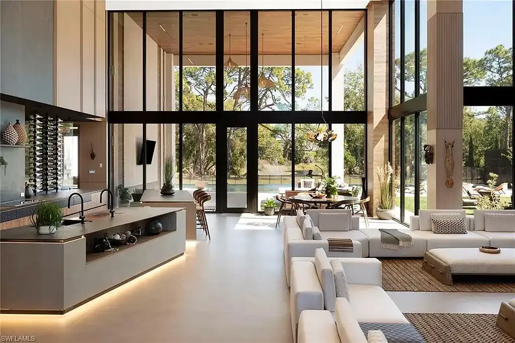 $14.5 Million Stunning Resort-Style Masterpiece in Naples Real Estate Showcases Breathtaking Modern Luxury Living 8 6616 Trail BLVD Naples luxury home with modern architecture, infinity pool, lakefront views, and resort-style outdoor living in Pine Ridge Estates