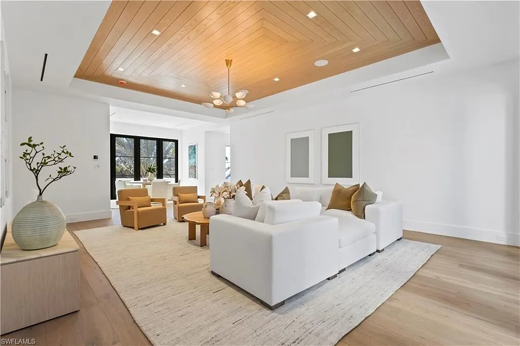 $12.5 Million Spectacular New Coastal Estate Debuts in Naples Real Estate Near Gulf Beaches 7 745 Pectin RD luxury home in Naples Florida featuring modern coastal architecture, resort-style pool and outdoor kitchen in Coquina Sands.