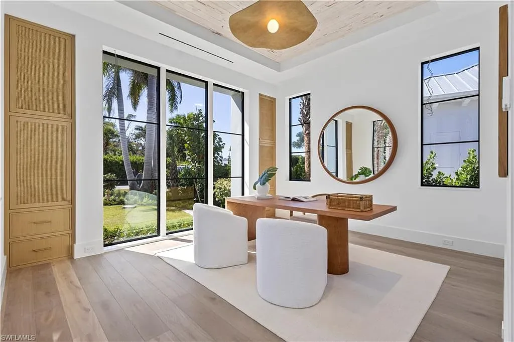 $12.5 Million Spectacular New Coastal Estate Debuts in Naples Real Estate Near Gulf Beaches 11 745 Pectin RD luxury home in Naples Florida featuring modern coastal architecture, resort-style pool and outdoor kitchen in Coquina Sands.