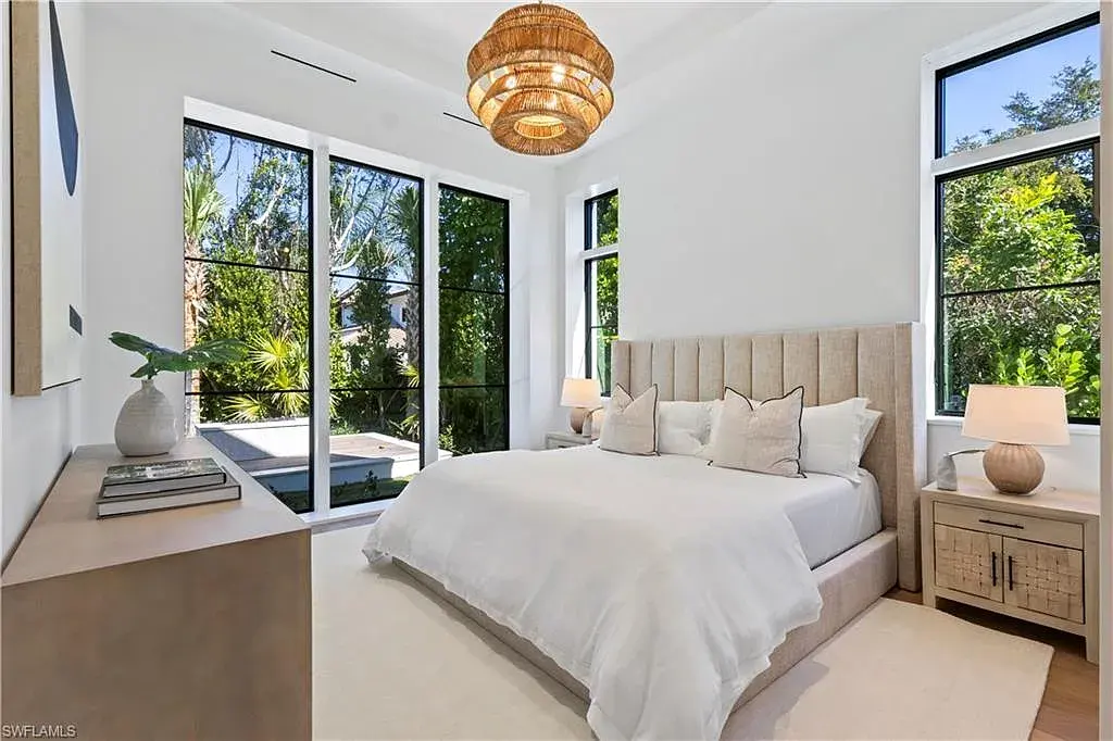 $12.5 Million Spectacular New Coastal Estate Debuts in Naples Real Estate Near Gulf Beaches 14 745 Pectin RD luxury home in Naples Florida featuring modern coastal architecture, resort-style pool and outdoor kitchen in Coquina Sands.