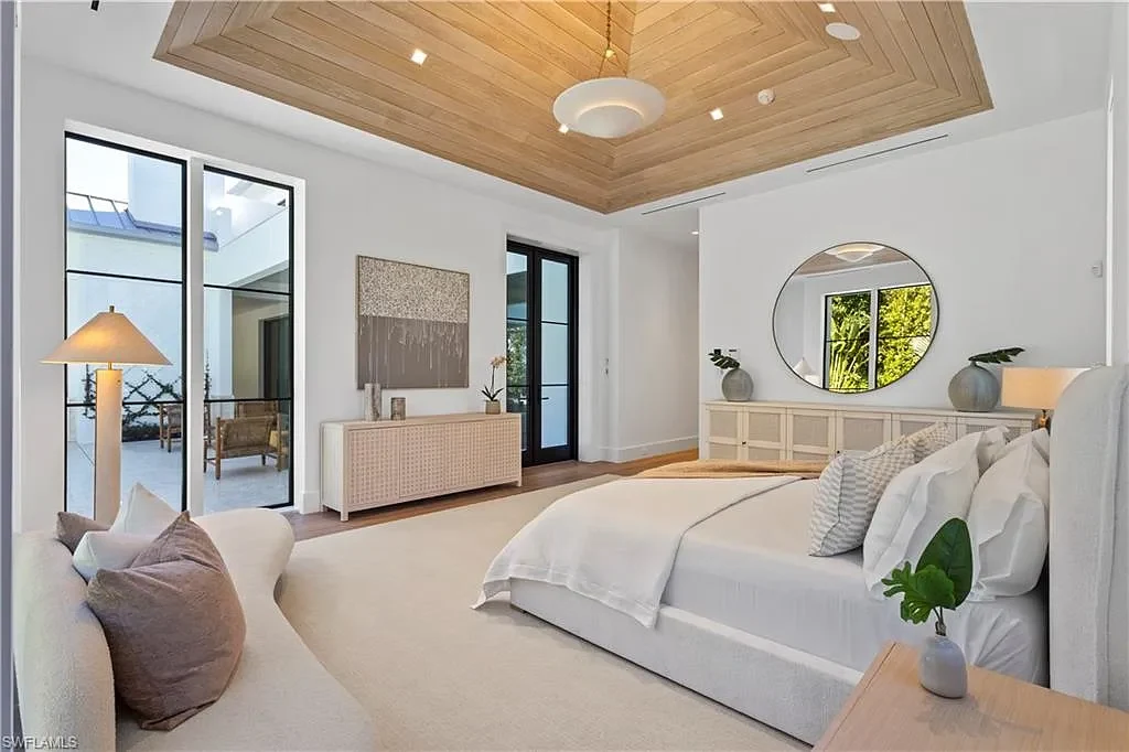 $12.5 Million Spectacular New Coastal Estate Debuts in Naples Real Estate Near Gulf Beaches 13 745 Pectin RD luxury home in Naples Florida featuring modern coastal architecture, resort-style pool and outdoor kitchen in Coquina Sands.