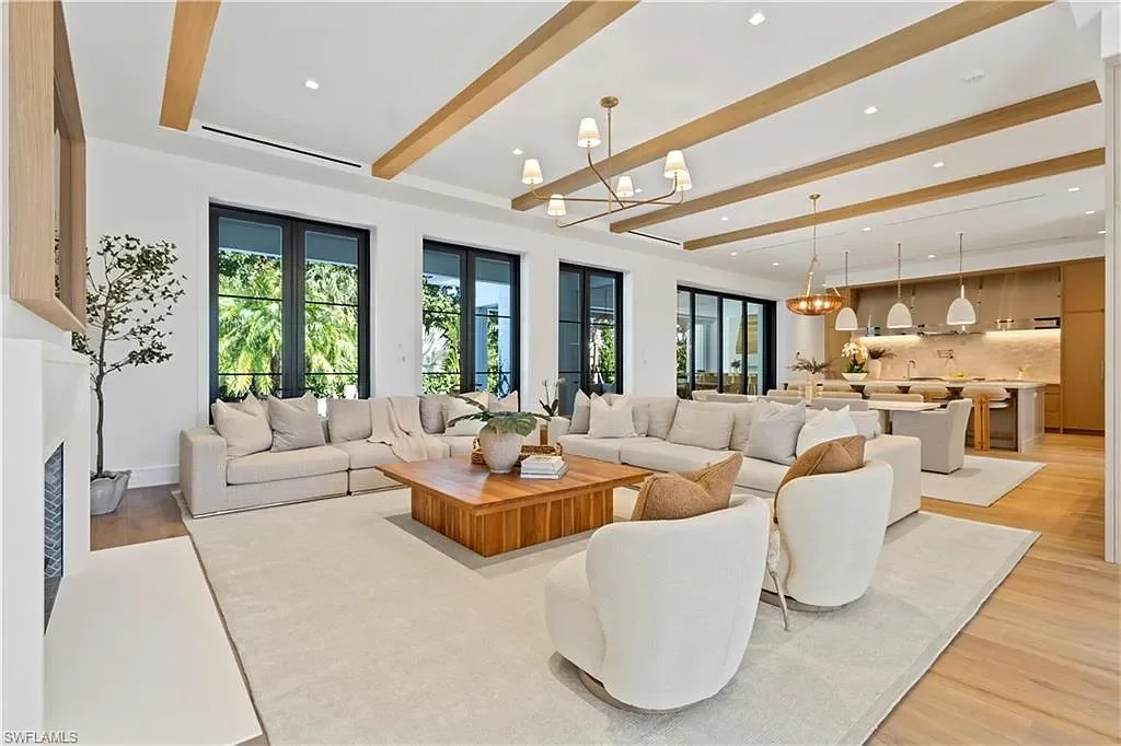 $12.5 Million Spectacular New Coastal Estate Debuts in Naples Real Estate Near Gulf Beaches 6 745 Pectin RD luxury home in Naples Florida featuring modern coastal architecture, resort-style pool and outdoor kitchen in Coquina Sands.