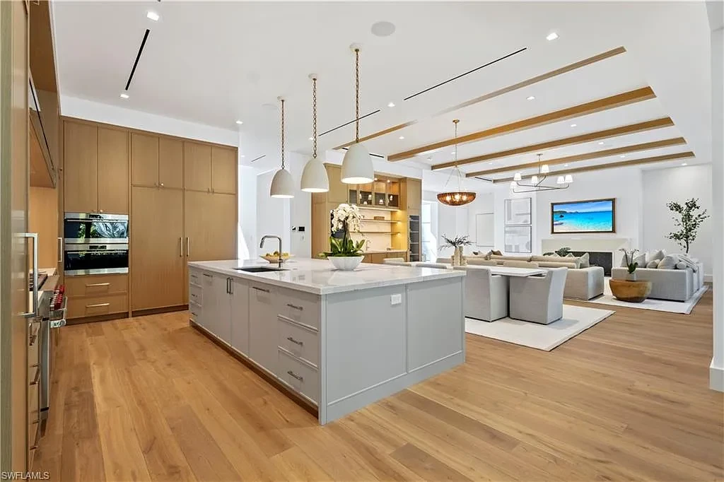 $12.5 Million Spectacular New Coastal Estate Debuts in Naples Real Estate Near Gulf Beaches 9 745 Pectin RD luxury home in Naples Florida featuring modern coastal architecture, resort-style pool and outdoor kitchen in Coquina Sands.