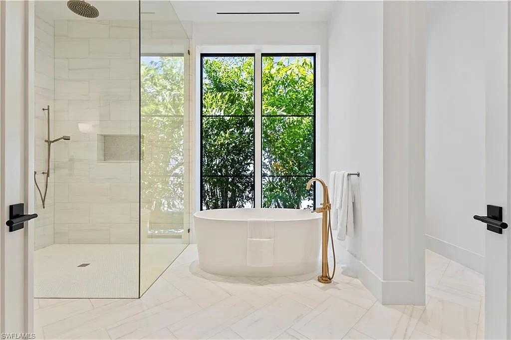 $12.5 Million Spectacular New Coastal Estate Debuts in Naples Real Estate Near Gulf Beaches 15 745 Pectin RD luxury home in Naples Florida featuring modern coastal architecture, resort-style pool and outdoor kitchen in Coquina Sands.