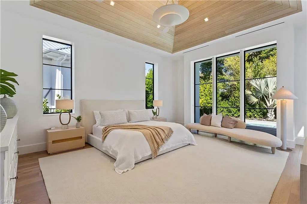 $12.5 Million Spectacular New Coastal Estate Debuts in Naples Real Estate Near Gulf Beaches 12 745 Pectin RD luxury home in Naples Florida featuring modern coastal architecture, resort-style pool and outdoor kitchen in Coquina Sands.