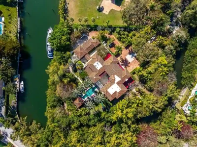 A $75 Million Private Peninsula Estate Sets a New Standard for Waterfront Living in Coral Gables 1 9401 Journeys End Rd for Sale at 75 Million – A Landmark Waterfront Estate in Coral Gables Real Estate 1