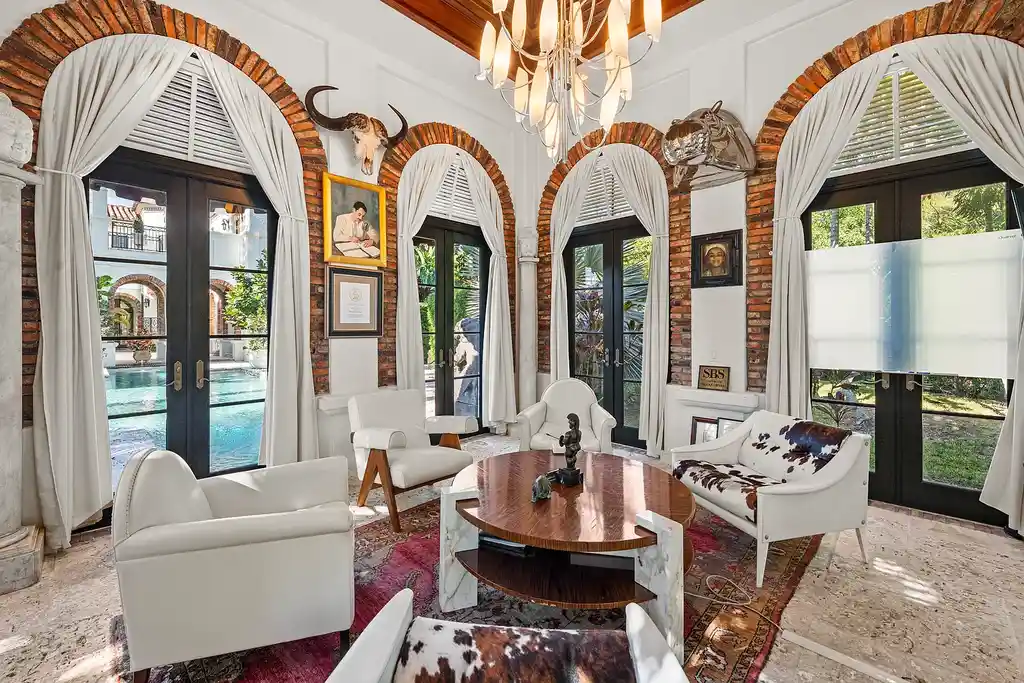 A $75 Million Private Peninsula Estate Sets a New Standard for Waterfront Living in Coral Gables 16 Tuscan-inspired waterfront estate at 9401 Journeys End Rd in Coral Gables featuring private peninsula, yacht dockage, luxury pool, and resort-style outdoor living