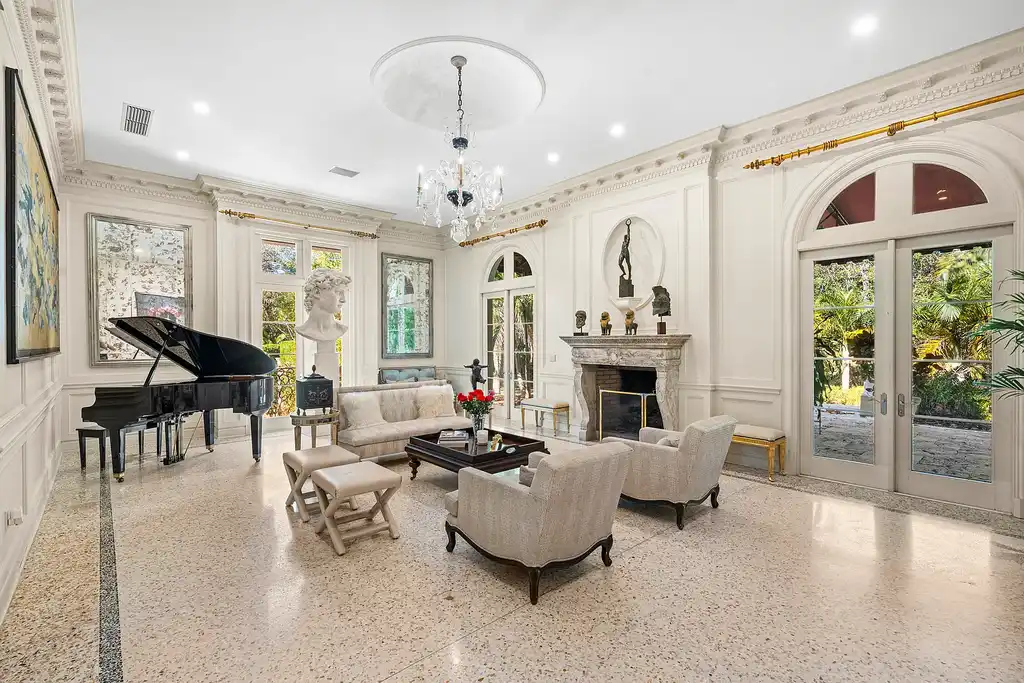 A $75 Million Private Peninsula Estate Sets a New Standard for Waterfront Living in Coral Gables 11 Tuscan-inspired waterfront estate at 9401 Journeys End Rd in Coral Gables featuring private peninsula, yacht dockage, luxury pool, and resort-style outdoor living