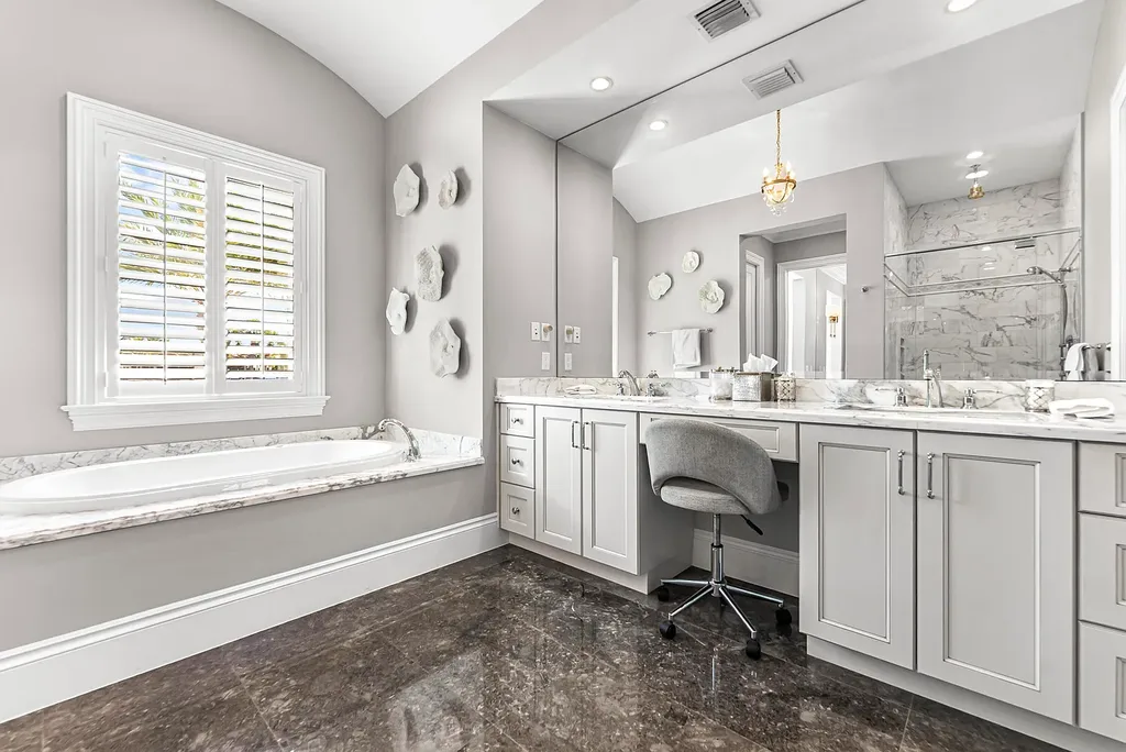 Stunning $10.5 Million British West Indies Waterfront Estate Hits the Market in Delray Beach 13 976 Cypress Drive luxury waterfront estate exterior view in Delray Beach with British West Indies architecture